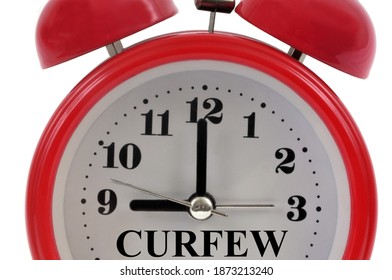 Curfew Concept With A Bell Alarm Clock Close Up