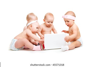 Curious babies group  working at laptop, isolated