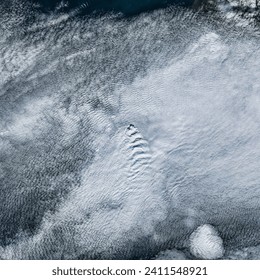 A Curious Case of Clouds in Iceland. Waves in the atmosphere can form for a variety of reasons, from rugged topography to the collision of air. Elements of this image furnished by NASA. - Powered by Shutterstock