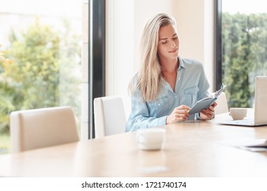 Curious Diligent Young Female Student Studies A Foreign Language, Receives Additional Education On Online Courses. Daily Planner . Planning And Time Management Concept. Education In Internet