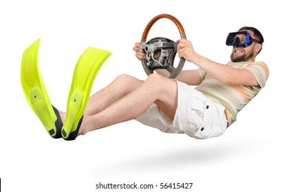 Curious man in flippers and shorts with a wheel racing (isolated)