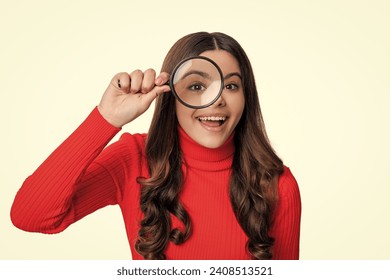 Curious mind. teen girl use magnifying glass for curiosity. school education for curious teen girl. magnifying and discovering. Unquenchable curiosity. Insatiable thirst for knowledge