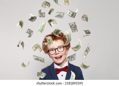 Curious Redhead Little Kid Boy With Us Dollar Money Rain On White Background