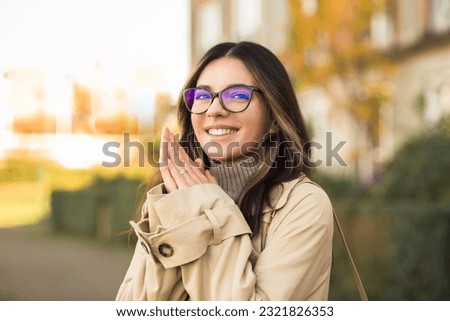 Curious young student visualising her future, dreaming and planning woman 20s with glasses