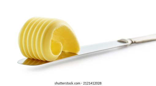 curl of fresh butter on a knife isolated on white background - Shutterstock ID 2121412028