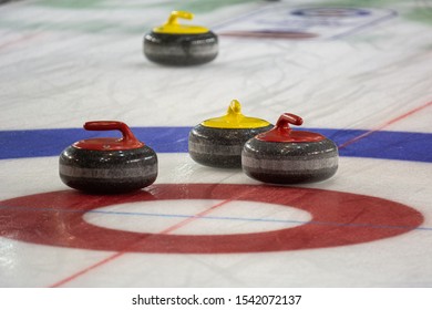 Curling Game And Stones On Ice