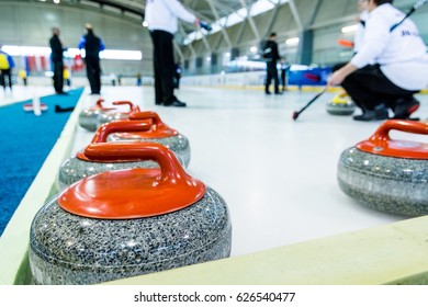 Curling Stone On A Game Sheet.