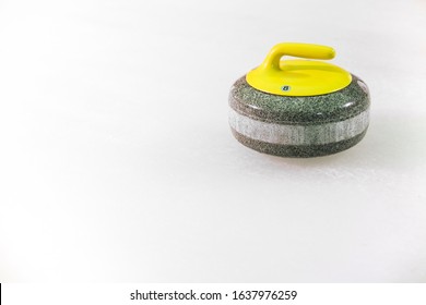 curling stone on ice colorful background