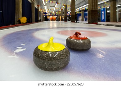 Curling Stone On Ice Of A Indoors Rink