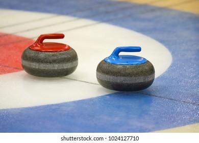 Curling Stones On Ice