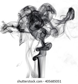 Curls Of Black Smoke On A White Background