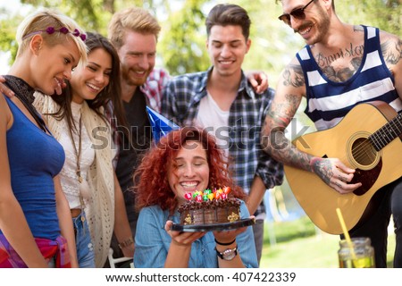 Similar – Man with piece of cake in a summer barbecue