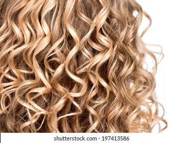 Curly Blonde Hair Closeup. Wavy Blond Hair Background. Close Up Texture Of Permed Hair. Hairstyle