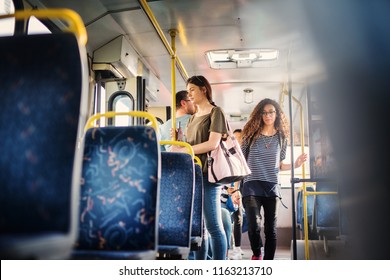 Curly Girl Is Passing Through The Bus And Trying To Find A Free Seat.