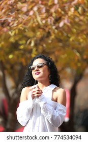 Curly Hairs African American Girl Praying Outside With Sunglasses, Autumn Background, Asking God, Hope, Religious Christian Female