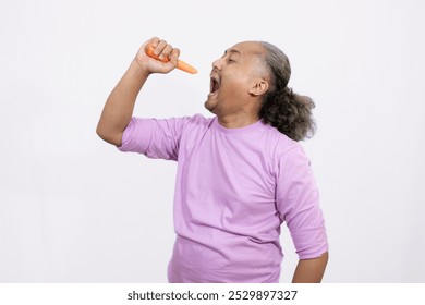 curly-haired adult male wants to eat fresh carrots, healthy lifestyle concept, isolated white background. - Powered by Shutterstock