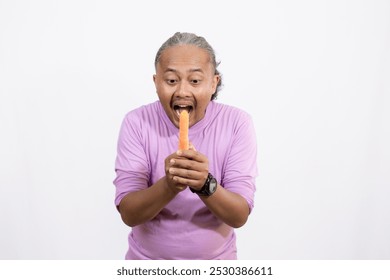 curly-haired adult male wants to eat fresh carrots, healthy lifestyle concept, isolated white background. - Powered by Shutterstock