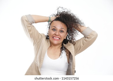 Curly-haired Girl, Pulling Her Hair In Despair. Teacher Or Stressed Mom