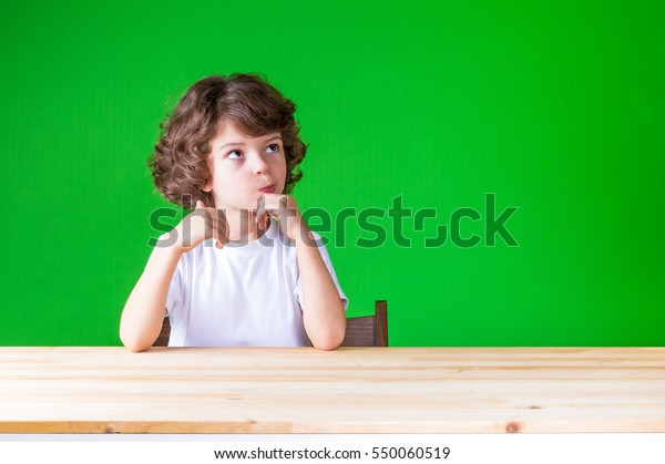 Curlyhaired Pretty Boy Looks Surprise Sitting Stock Photo Edit