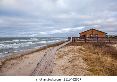 CURONIAN SPIT, RUSSIA - DECEMBER 17, 2021: Photo Of Sand Dunes, Baltic Sea And Vinland Cafe.