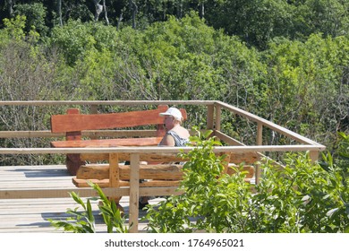 Curonian Spit,Russia- June 24,2020: Woman Talking On The Phone Curonian Spit 