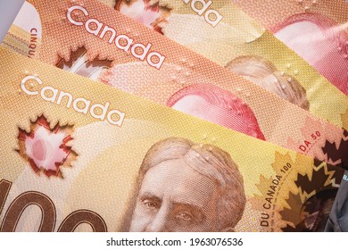 Currency of Canada. Close-up of some Canadian dollar banknotes