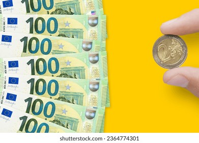 Currency of European Union. EUR is the official currency of the European Union. The concept of financial crisis and recession - Shutterstock ID 2364774301