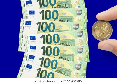 Currency of European Union. EUR is the official currency of the European Union. The concept of financial crisis and recession - Shutterstock ID 2364800795