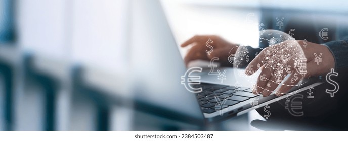 Currency exchange, money transfer, FinTech financial technology, Global business, online banking, interbank payment concept. Man using mobile phone and laptop computer with international currencies - Powered by Shutterstock