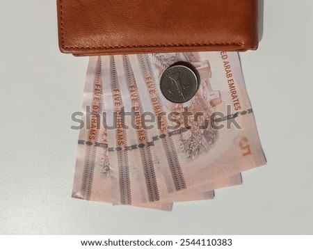 Currency notes, UAE Emirates currency 05 Aed, Dirhams, Closeup of UAE Five dirhams currency notes, paper money 5 Aed dirhams.
Dirhams banknotes, UAE Emirati Paper currencies notes 05 dirham currency