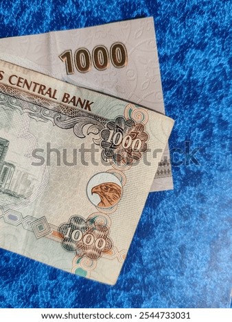 Currency notes, UAE Emirates currency 1000Aed, Dirhams, Closeup of UAE One Thousand dirhams currency notes, paper money 1000 Aed dirhams
Dirhams banknotes, UAE Emirati Paper currency 1000 aed dirham