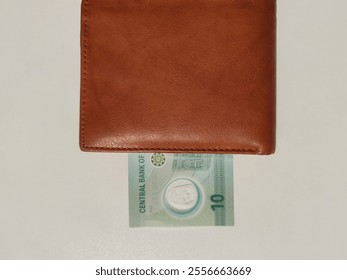 Currency notes, UAE Emirates currency 10Aed, Dirhams, Closeup of UAE Ten dirhams currency notes, paper money 10 AED dirhams.
Dirhams banknotes, UAE Emirati Paper currencies notes 10 dirham