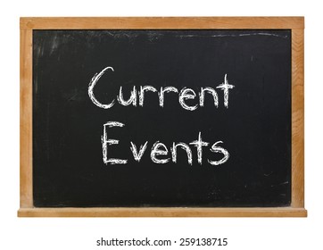 Current Events Written In White Chalk On A Black Chalkboard Isolated On White