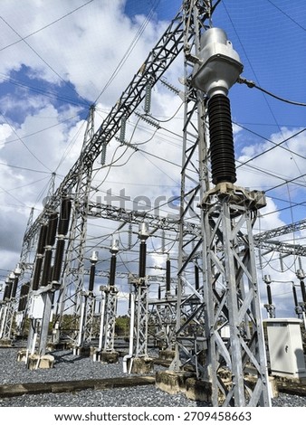 A current transformer accurately measures electrical current.

Device used for monitoring high electrical currents safely.

Instrument that converts large currents into measurable values.

Electrical 
