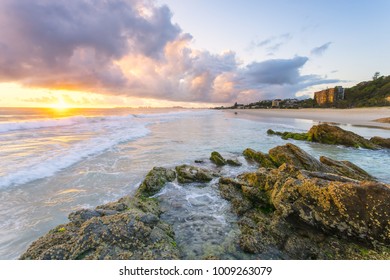 Currumbin Beach also known as Currumbin Alley at sunrise on the Gold Coast in Queensland in Australia