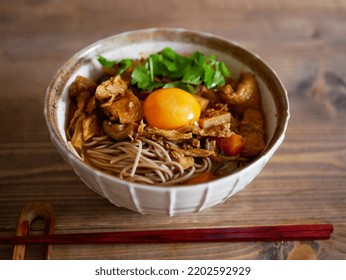 Curry Soba With Egg Yolk On Top