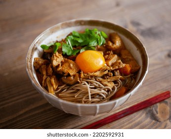 Curry Soba With Egg Yolk On Top