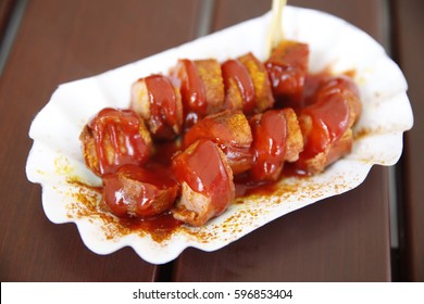 Currywurst, Fast Food Dish Of German Origin Consisting Of Pork Sausage (German: Bratwurst) Typically Cut Into Slices And Seasoned With Curry Ketchup, A Sauce Based On Spiced Ketchup Or Tomato Paste