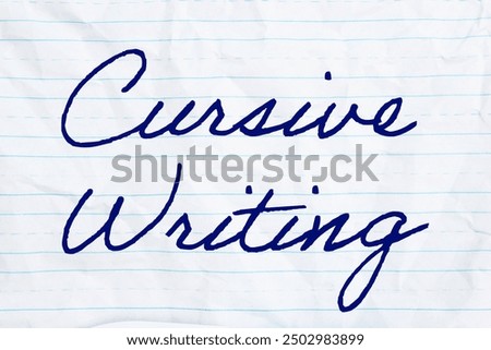 Cursive Writing on retro lined school crumpled paper being taught in school