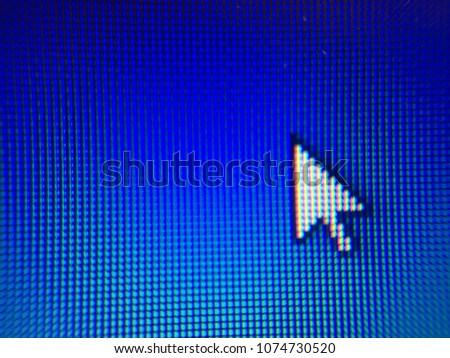 Cursor arrow macro closeup with blue dotted background