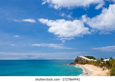 Curtain Bluff Beach And Resort In Antigua. On The Horizon The Active Volcano Of Montserrat, Just Starting A Bigger Eruption.