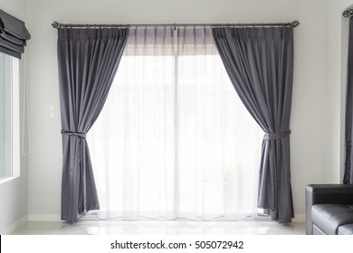 Curtain interior decoration in living room with sunlight - Shutterstock ID 505072942