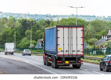 Curtain Side Lorry Truck On Uk Motorway In Fast Motion