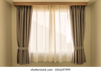 Curtain with warm sunlight - Shutterstock ID 1016197999