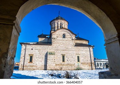 Curtea De Arges Town, Romania. The Royal Court Church Of Wallachia In Winter. Curtea Domneasca.