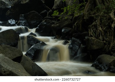 curug gamelan in Salatiga, Central Java. Indonesia. Waerfalls with giant rocks. Long Exposure Photography. Blurred Motions.