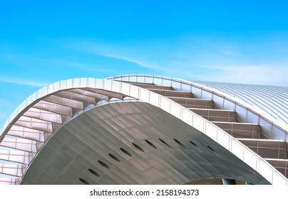 Curve Metal Roof of Modern Building against blue sky background - Powered by Shutterstock