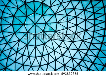 Curved Blue Glass Roof or Ceiling of Dome with Geometric Structure Black Steel in Modern and Contemporary Architecture Style as abstract architectural and industrial background or pattern