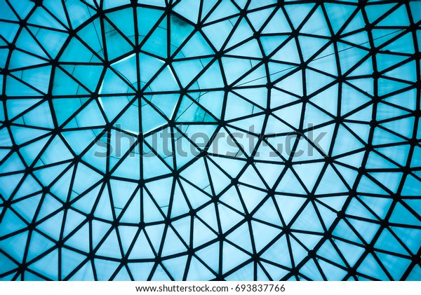Curved\
Blue Glass Roof or Ceiling of Dome with Geometric Structure Black\
Steel in Modern and Contemporary Architecture Style as abstract\
architectural and industrial background or\
pattern