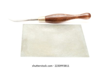 Curved burnisher tool used in engraving, isolated on white background
 - Shutterstock ID 2230993811